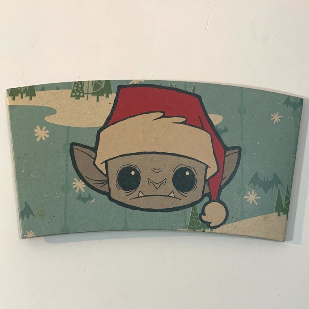 Gideon's Bakehouse Babegubadijadzs Baby Gargoyle Christmas 2023 Coffee Sleeve